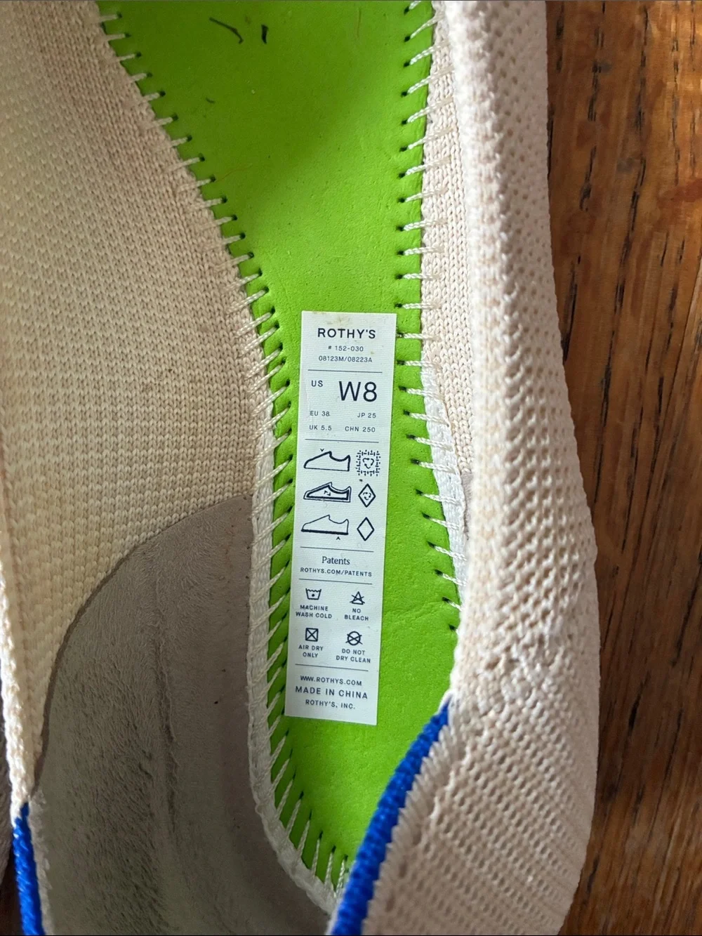 Rothy's Pointed Knit Flats in Cream with Blue Trim
